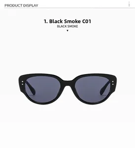Detail of vintage cat eye sunglasses with glossy black frame and metallic rivet accents