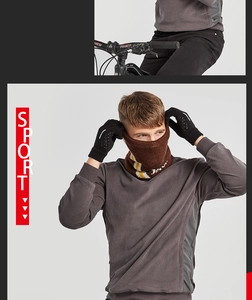 Close-up of brown knitted sports neck warmer with stripes and black anti-slip gloves