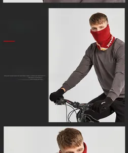 Close-up of winter thermal cycling gloves and knitted neck gaiter for outdoor sports