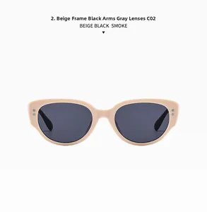 Front view of beige cat-eye sunglasses with black temples and grey smoke lenses