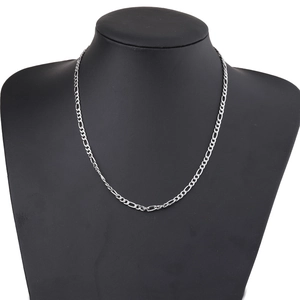 Polished 4mm stainless steel Figaro link chain necklace shown on black jewelry mannequin