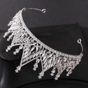 Close-up of sparkling silver crown with marquise-cut white crystals and rhinestones