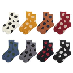 Set of 8 pairs colorful polka dot crew socks in various retro patterns for women
