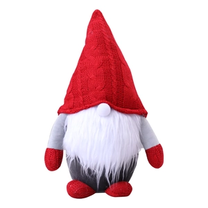 Plush Christmas gnome with red knitted hat and white beard for festive home decoration