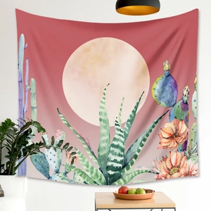 Detail of bohemian tapestry featuring watercolor cactus, aloe plants and a full moon