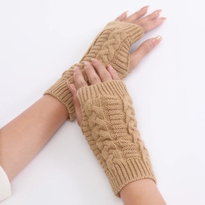Close-up of camel knit fingerless gloves featuring classic cable twist patterns
