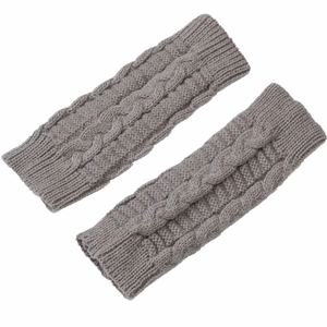 Detailed close-up of gray knit arm warmers featuring classic thick cable knit patterns