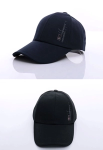Detailed views showing side text embroidery and structure of the navy cotton baseball cap