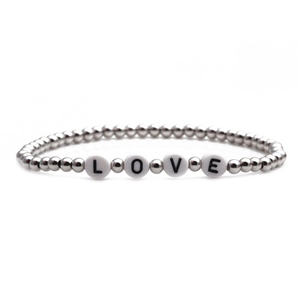 Minimalist 4mm silver beaded bracelet with LOVE letter charms on white background