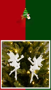 Macro detail of white glitter fairy wing Christmas tree ornaments with warm LED lighting