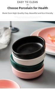 Stackable matte ceramic dipping bowls in black, white, green and pink for sauce