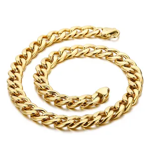 Detailed close-up of a spiral-wound golden stainless steel flat Cuban link chain