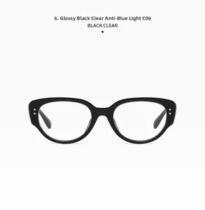 Front view of black cat-eye glasses frame with metal accents and clear anti-blue lenses