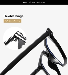 Detail of the high-quality flexible metal hinge on shiny black fashion glasses frames