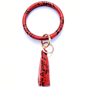Red snake skin pattern leather keychain bracelet with golden ring and tassel charm