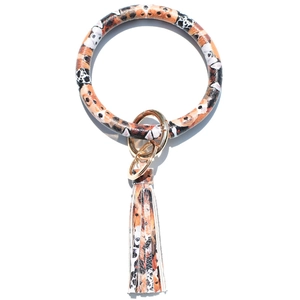 Leren sleutelhanger armband met Beagle-print, gouden sluiting en een lange kwast