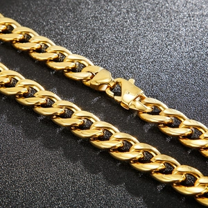 Close-up of 18K gold plated Cuban link chain necklace with a sturdy lobster clasp