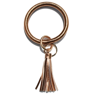 Rose gold lychee pattern leather keyring bracelet featuring a stylish long tassel charm