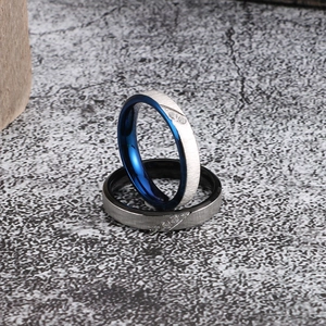Brushed stainless steel 18K gold plated rings with small diamonds on grey stone