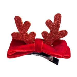 Christmas reindeer antler hair clip with red velvet bow and glitter decoration