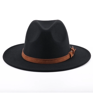 Detail of black wool fedora hat featuring a brown faux leather band with metal buckle