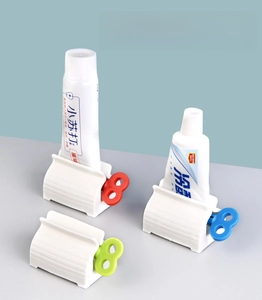 Three-piece rolling tube toothpaste squeezer set with colorful knobs for easy dispensing
