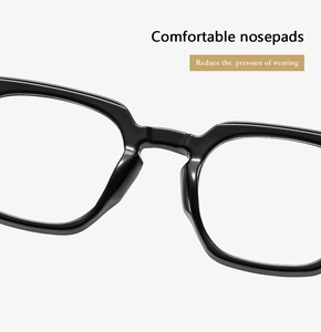 Macro detail of comfortable nose pads on black frames to reduce bridge pressure