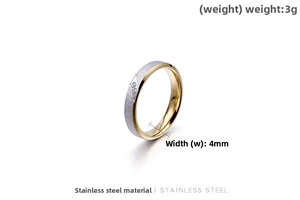 Detail of 4mm brushed stainless steel ring with two small zircons and 18K gold finish