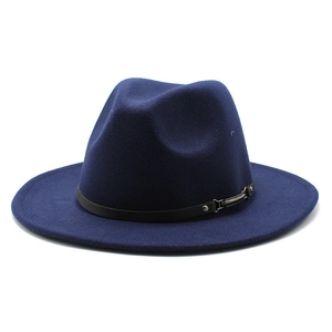 Detail of navy wool fedora hat featuring a black leather band and silver metal buckle