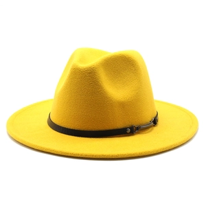 Close-up of ginger wool fedora hat with black leather strap and metal buckle detail