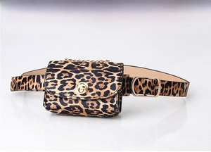 Detail of leopard print waist bag featuring gold turn-lock and chain strap decoration