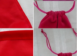 Detail shot of red and pink velvet jewelry pouches showing stitching and drawstrings