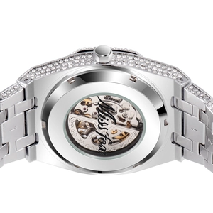 Macro view of Miss Fox iced-out mechanical watch featuring clear back case and inner gears