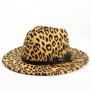 Detailed view of leopard print wool fedora hat featuring a black leather decorative band