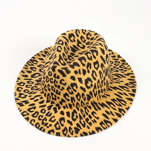 Detailed top view of leopard print fedora hat showing felt texture and flat brim