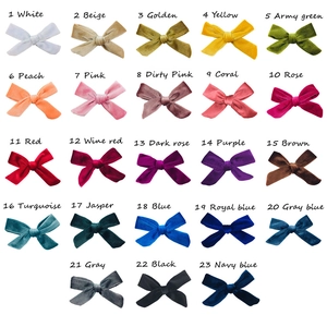 Detailed grid of 23 velvet hair bows showing various colors and textures for accessories