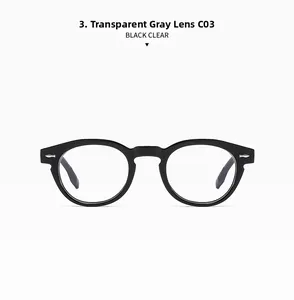 Close-up of black oversized frame sunglasses with transparent grey lenses C03