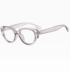 Detail view of translucent light purple cat-eye frame glasses with narrow temple arms