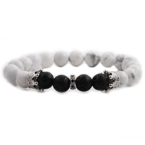 Howlite and lava stone crown bracelet set featuring black and white volcanic rock beads