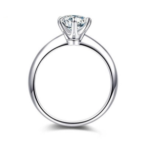 Elegant six-prong solitaire ring with a brilliant round moissanite in silver finish