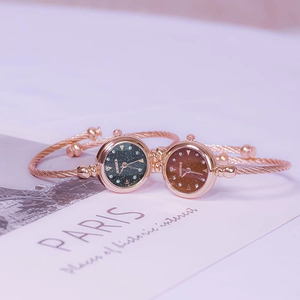 Elegant rose gold cuff watches for women featuring starry sky and gradient dials