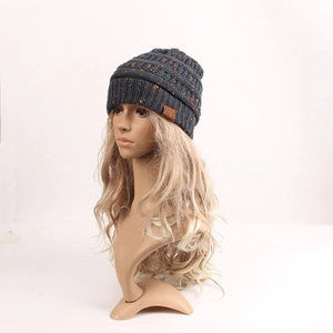 Winter chunky knit beanie in dark gray mixed yarn with iconic brown leather C.C patch