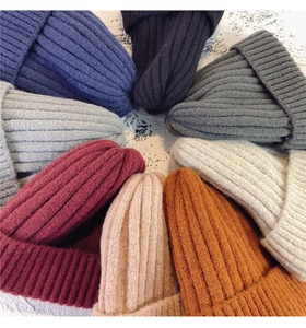 Multiple color options of thick ribbed knit beanies for winter warmth and comfort
