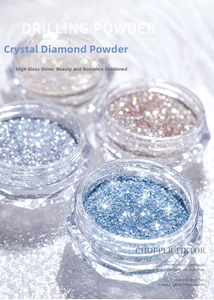 Macro detail of four sparkling nail glitter powder jars in blue, silver, and rose gold tones