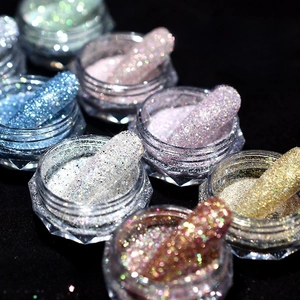 Sparkling crystal nail art glitter powder set in various colors on black background