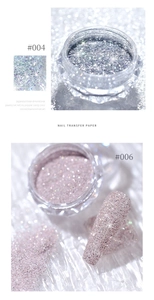 Macro shot of silver nail art glitter powder #004 and #006 in round glass jars