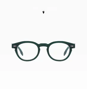 Detail view of jelly green round glasses frame with silver rivets and anti-blue light lenses