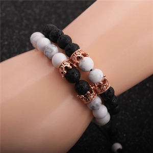 8mm lava and white turquoise crown bracelets set worn on wrist by a couple
