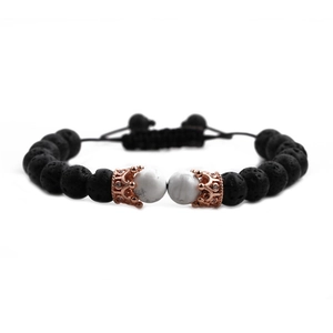 Men's crown bracelet set with black lava stones, white turquoise, and rose gold charms