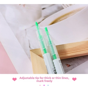 Detailed view of dual-tip green highlighter tips with round and chisel point options
